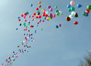 balloon release with balloons filled with wildflower seed