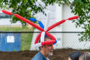 A happy customer with a balloon hat. One of my favorite things to twist.